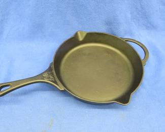 Lot 217. Pioneer Woman 12" cast iron skillet in very good condition