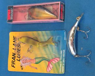 Lot 410. Three vintage baits: