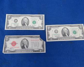 Lot 324. Three $2.00 bills