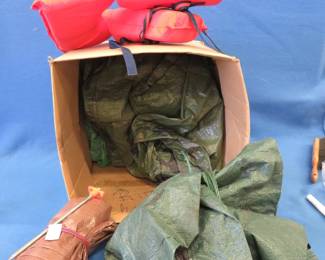 Lot 476. Three tarps of undetermined dimensions and a life jacket