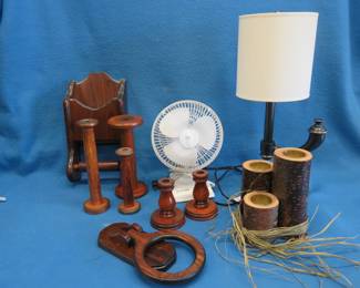 Lot 214. Vintage spools, candle holders, fan and lamp