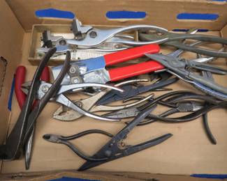 Lot 76. Pliers, spring tool, and more