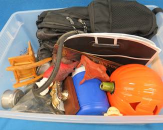 Lot 128. 66 quart Sterilite tote with misc items