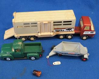 Lot 409. Vintage Tonka Truck and horse trailer and other old toys