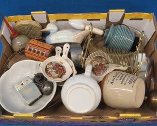 Lot 127. Old oil cans, pocket transistor radio, McCoy pitcher, and more