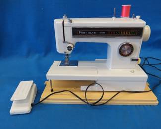 Lot 478. Sears Kenmore 12-stitch sewing machine and case in very good condition