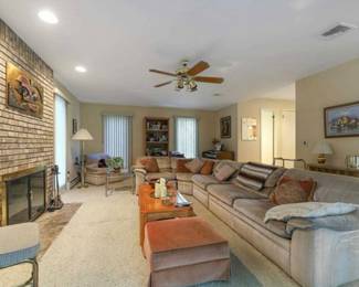 Family room section couch with extra piece in the corner ,coffee table  bookcase  