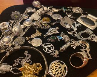 Assorted "fun" jewelry pins and brooches.