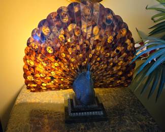 The peacock lamp lit