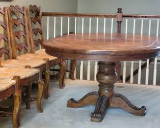 STUNNING EXCELLENT CONDITION ROUND/OVAL WITH LEAF SOLID WOOD TABLE WITH 8 PLUS 1 EXTRA....LADDER BACK CHAIRS WITH RUSH SEATING. GEARED MECHANISM FOR EASE OF INSERT AND REMOVAL OF LEAF-STUNNING DESIGN AND DETAILS...QUALITY SOLID SET WITH TABLE PROTECTOR AS WELL $400