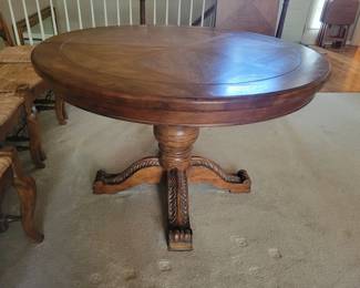 STUNNING EXCELLENT CONDITION ROUND/OVAL WITH LEAF SOLID WOOD TABLE WITH 8 PLUS 1 EXTRA....LADDER BACK CHAIRS WITH RUSH SEATING. GEARED MECHANISM FOR EASE OF INSERT AND REMOVAL OF LEAF-STUNNING DESIGN AND DETAILS...QUALITY SOLID SET WITH TABLE PROTECTOR AS WELL $400