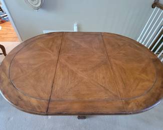 STUNNING EXCELLENT CONDITION ROUND/OVAL WITH LEAF SOLID WOOD TABLE WITH 8 PLUS 1 EXTRA....LADDER BACK CHAIRS WITH RUSH SEATING. GEARED MECHANISM FOR EASE OF INSERT AND REMOVAL OF LEAF-STUNNING DESIGN AND DETAILS...QUALITY SOLID SET WITH TABLE PROTECTOR AS WELL $400