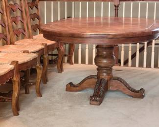 STUNNING EXCELLENT CONDITION ROUND/OVAL WITH LEAF SOLID WOOD TABLE WITH 8 PLUS 1 EXTRA....LADDER BACK CHAIRS WITH RUSH SEATING. GEARED MECHANISM FOR EASE OF INSERT AND REMOVAL OF LEAF-STUNNING DESIGN AND DETAILS...QUALITY SOLID SET WITH TABLE PROTECTOR AS WELL $400