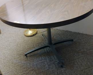 Retro round formica  table with four high tops swivel black chairs