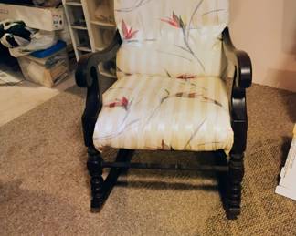 Old antique mahogany rocker with original green velvet upholstery under the cover