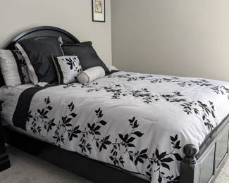 Modern black Queen Size Bed with linens