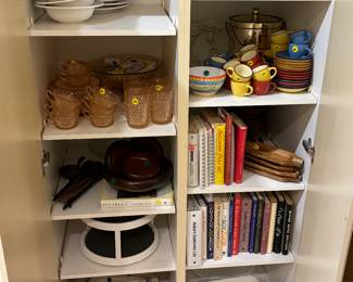 Bakeware including LeCreuset, vintage cookbooks, rose colored cut glass dishes 