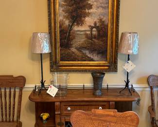 Vintage oak server w lead glass on doors, pair iron buffet lamps, glass ice bucket, gorgeous oil painting in gold frame