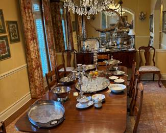 Lots of beautiful Silver trays, cut glass candy dish & water glasses, 3 cup convertible to 1 cup silver Sol Goldfeder Candelabras , beautiful mahogany dining table, set of 8 Oak Ladder back dining chairs w rush seats 