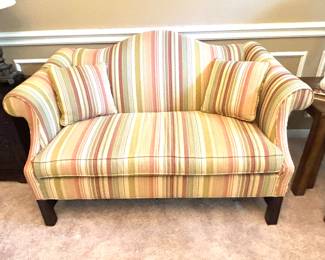 Chippendale style camel back love seat