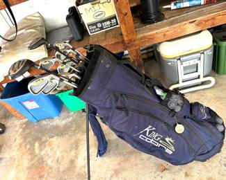 Assorted golf clubs
