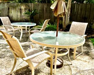 Patio tables and chairs by Winston