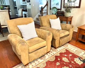 Pair of distressed recliners