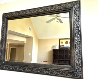 Carved black frame mirror