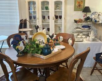Breakfast table has extra leaves and 6 chairs; white china cabinet