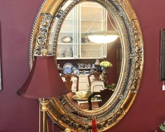 Ornate oval mirror