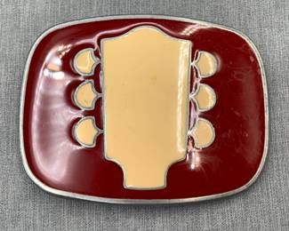Belt buckle guitar head