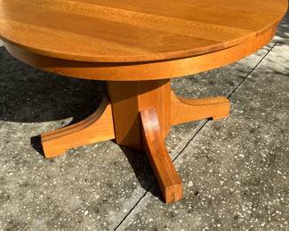 Solid Tiger Oak table with 3 additional leaves