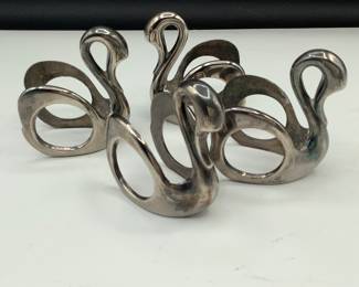 MCM swan napkin rings
