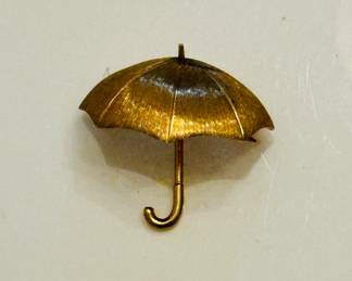 Gold umbrella brooch