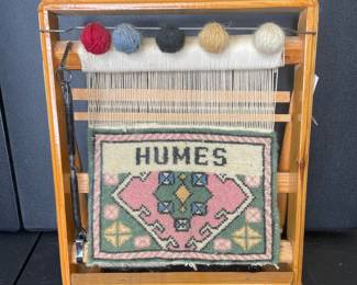 Tapestry on standing loom display