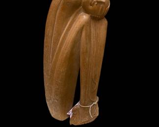 Wooden sleeping man sculpture 