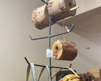 Longaberger basket, wood birdfeeders, metal hanging displays