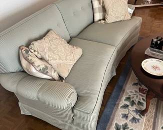 Slightly Curved Couch - Exceptional Condition - Heavy - Asking $500 - Will negotiate. Color is a light green/striped. 