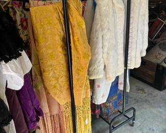 Racks of vintage clothing and furs 