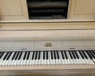 Player piano with rolls