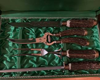 This amazing carving set was located under the couch  in the home