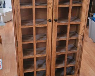 Solid wood curio  cabinet  ( items in the background are not for sale)