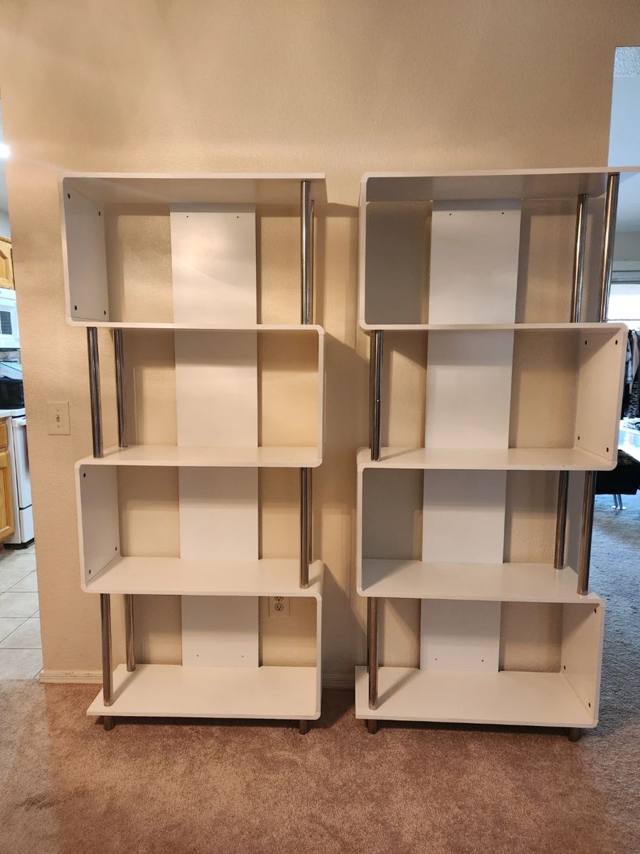 There two modern white shelves that are in great shape.  