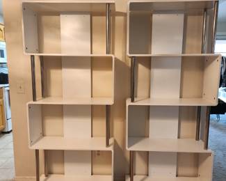 There two modern white shelves that are in great shape.  