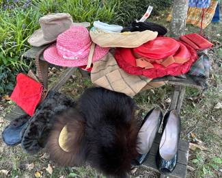 Mittens are genuine fur with leather grips and lined with wool. Cashmere and silk scarves.