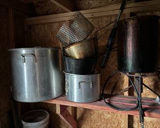 Several burners and large cooking pots