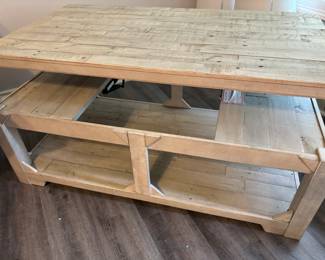 Coffee table with lift top
