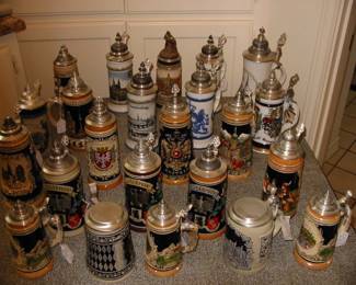 Multiple beer steins from all over the world