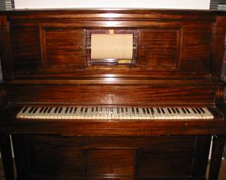Player piano with 56 rolls