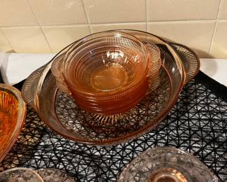 Pink depression, glass berry bowl with individual serving bowls, one berry bowl and seven serving bowls